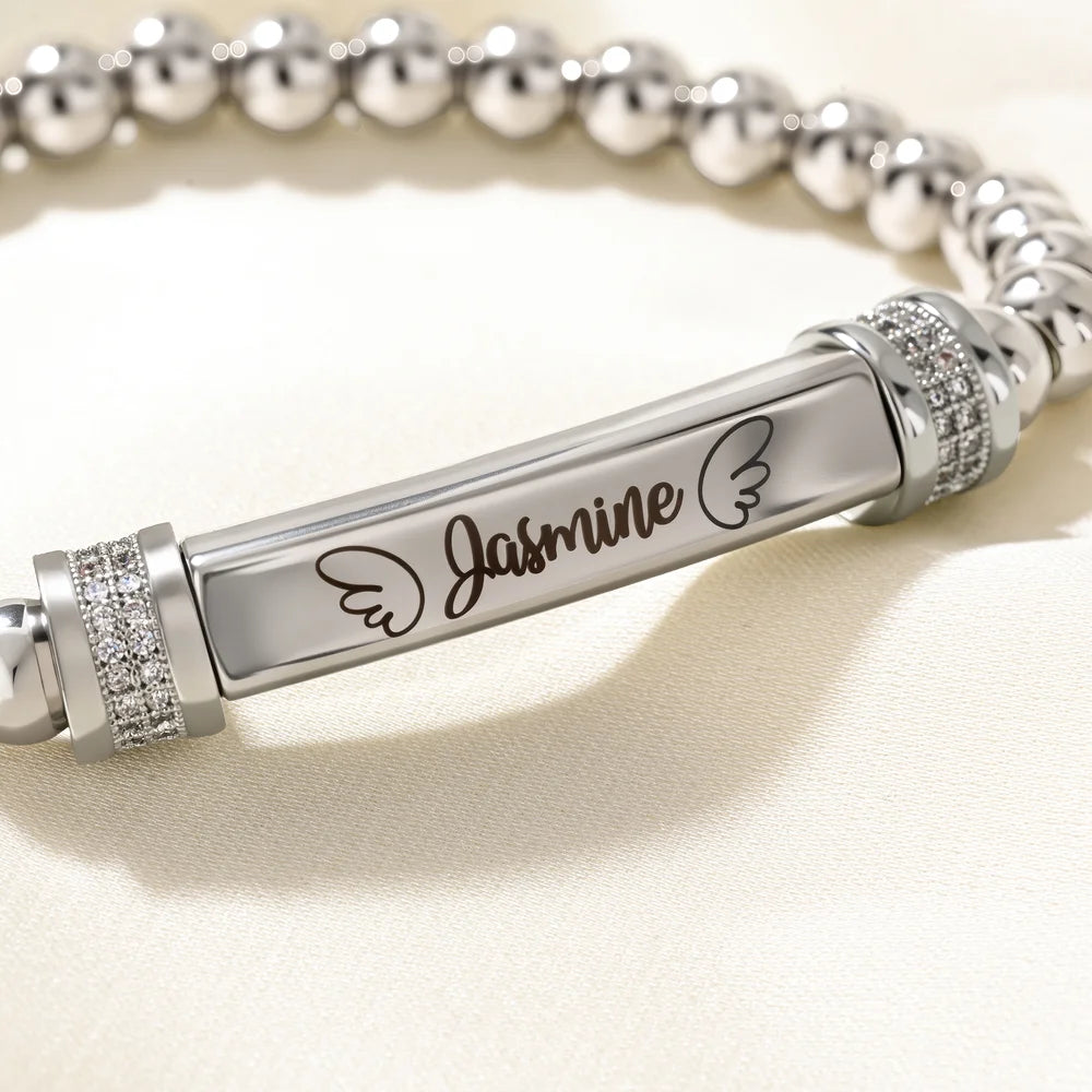 Bracciale personalizzato con ali a forma di cuore con nome